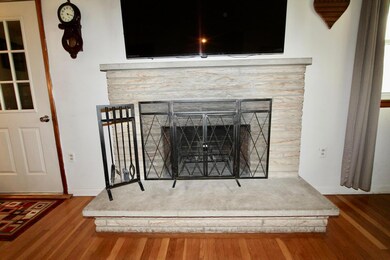 Log woodburning fireplace