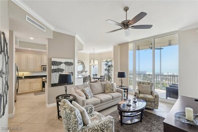 Living area featuring light tile patterned floorin