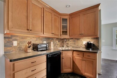 Renovated kitchen with custom cabinets.