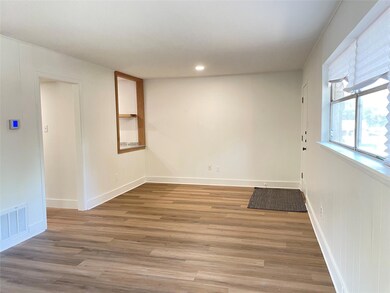 Unfurnished room featuring light wood-style floor