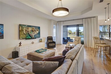 Living area featuring light wood-style floors, a r