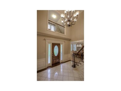 BALCONY FROM MASTER SUITE OVERLOOKS 2 STORY FOYER
