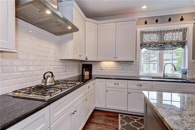 Custom cabinets and subway tile backsplash