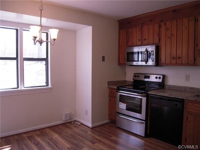 Bump out Eating area with New Laminate Wood Floors