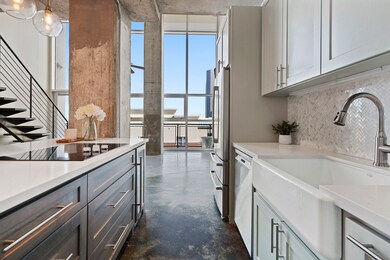 GLEAMING QUARTZ COUNTERS ARE ACCENTED BY SILVER TO