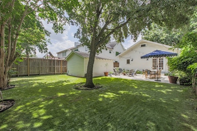 Incredible turfed backyard oasis with large patio