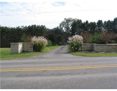 Exterior Front. Beautiful Landscaped grounds invit