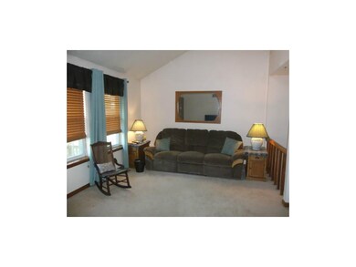 Living room with skylight and large windows!