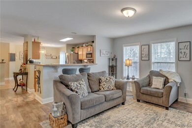 Living room with light wood-type flooring