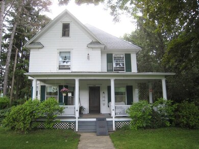 Nice front, covered sitting porch!
