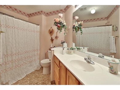 The upper level full bathroom is good sized and fe
