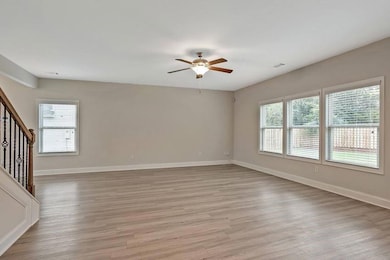 Unfurnished room with plenty of natural light, cei