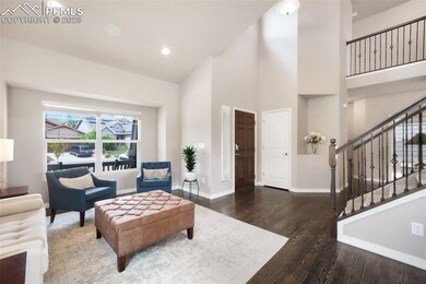 Front entry, hardwood floors, formal sitting room, bright vaulted ceilings