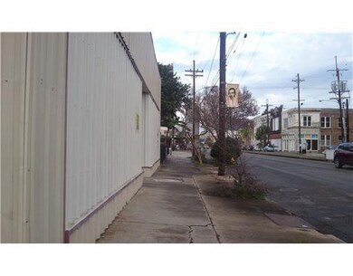 Photo. VIEW DOWN SIDEWALK