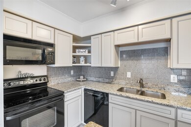 Upgraded kitchen cabinets and counters of granite.