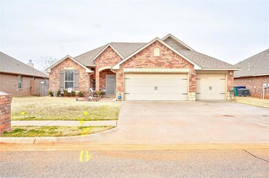View of front of home with a front yard, central A