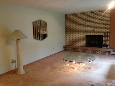 Living Room Living Room with one of two fireplaces