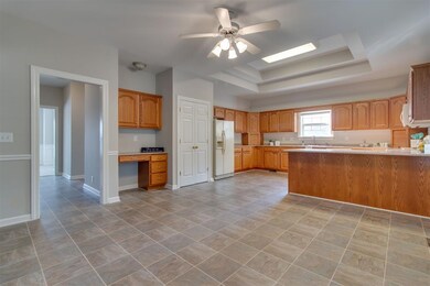 HUGE eat in kitchen with pantry, breakfast bar and desk area