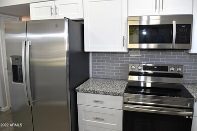 Custom Cabinets and Stainless Steel Appl