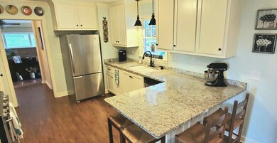 Granite Kitchen with Stainless Appliances