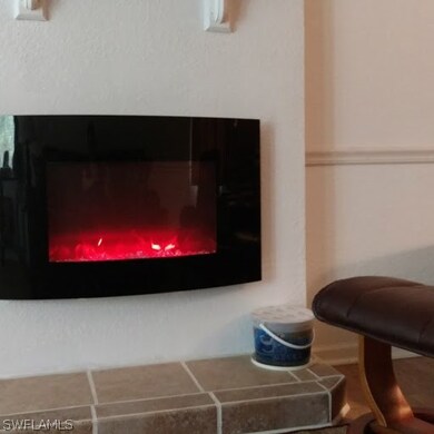 Electric fireplace in living room.