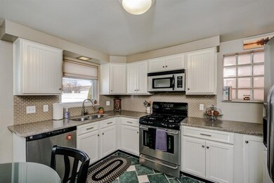 Stunning.  This renovated kitchen has refaced cabi
