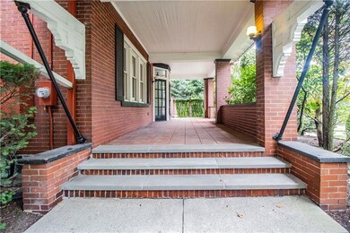 Lovely front porch with a natural shield from the 
