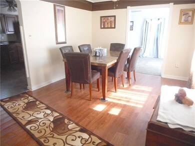 Dining Room: The gracious dining room is open to t