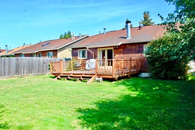 Fenced yard w/large rear deck