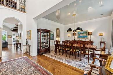 Dining space with parquet floors and ornamental mo