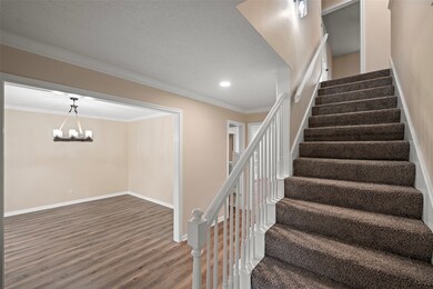 This foyer sets the tone for the entire home, offe