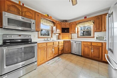 PLENTY OF CABINETS AND VIEWS OUT THE BACK WINDOW!