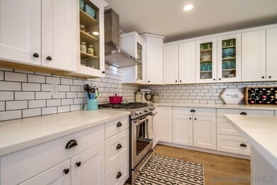 Quartz Countertops | Tile Backsplash