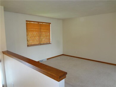 Living Room. Wood trim is a great accent to the ne