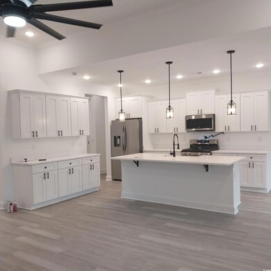 Kitchen featuring light hardwood / wood-style floo
