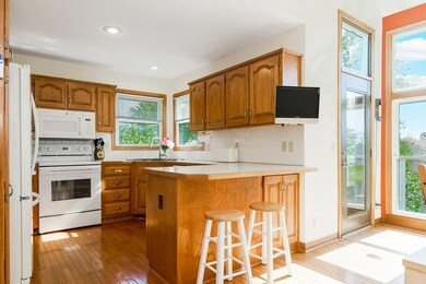 Kitchen with breakfast bar and attached TV that stays!