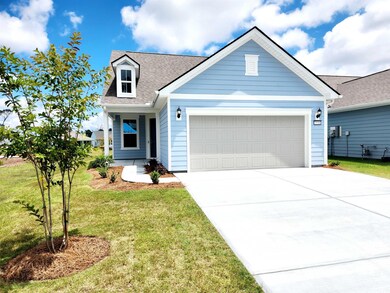 View of front of house featuring a garage and a fr