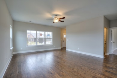 Another view of the living room.  Picture of similar home.