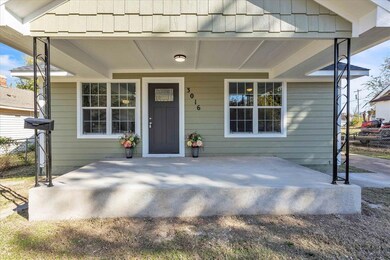 View of exterior entry with a porch