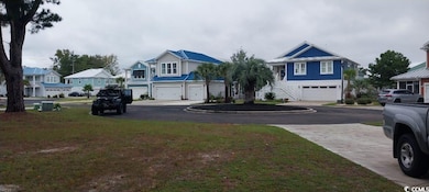 View of grassy yard with street views