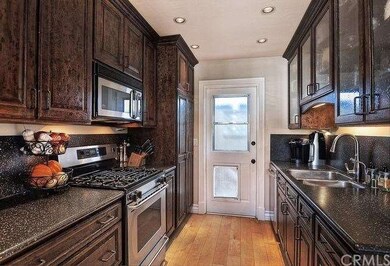 galley kitchen with corian counters and antique st