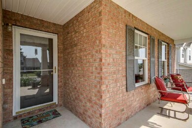 Keep your visitors dry as they come to visit under your spacious covered front porch.