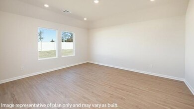 Spare room with recessed lighting and light wood-style flooring
