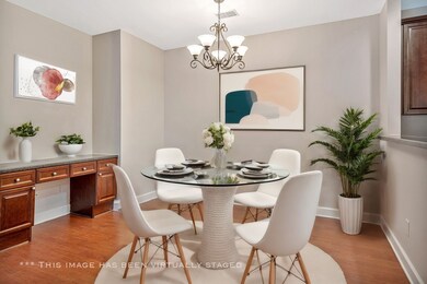 Utilize this area as your dining room or, with the built in desk, your office.
