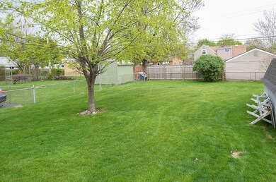 Spacious Fenced Back Yard with Shed