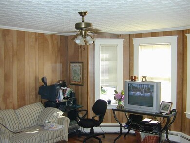 Tin Ceilings and a Bay window in the...