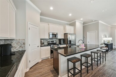 Kitchen featuring appliances with stainless steel