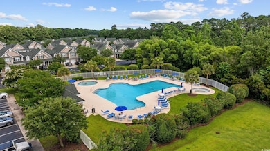 Aerial view of residential area with a pool area