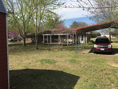 Back of Home...2 car carport.