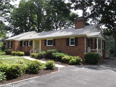 Exterior Front - Beautifully landscaped with side 